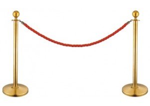 gold stanchions with red barrier rope